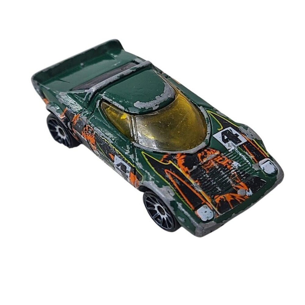 2004 Hot Wheels Lancia Stratos Tiki Torchers Green #4 Diecast Car With Orange &